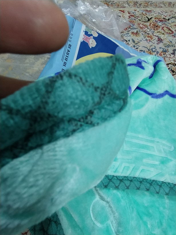 دور دوزی تمیز پتو